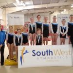 front row - Bethany Hill (coach), Vicki Pritchard (head coach), Gracie Cann, Meagan Fletcher, Rosie Cann, Jasper Pudner, Teegan Smith (coach and judge), Miya Porter (coach); back row - Lily Putman, Freya Hancock, Emily Szwarc, Bethany Medland, Evie Nicks, Coral Vallance