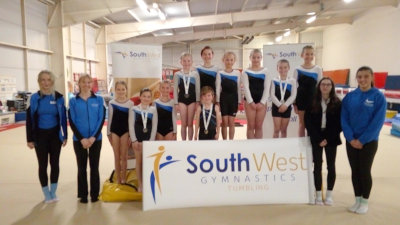 front row - Bethany Hill (coach), Vicki Pritchard (head coach), Gracie Cann, Meagan Fletcher, Rosie Cann, Jasper Pudner, Teegan Smith (coach and judge), Miya Porter (coach); back row - Lily Putman, Freya Hancock, Emily Szwarc, Bethany Medland, Evie Nicks, Coral Vallance